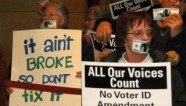Silent protest against Voter ID amendment at Minnesota state capitol. Photo by Eric Adams.